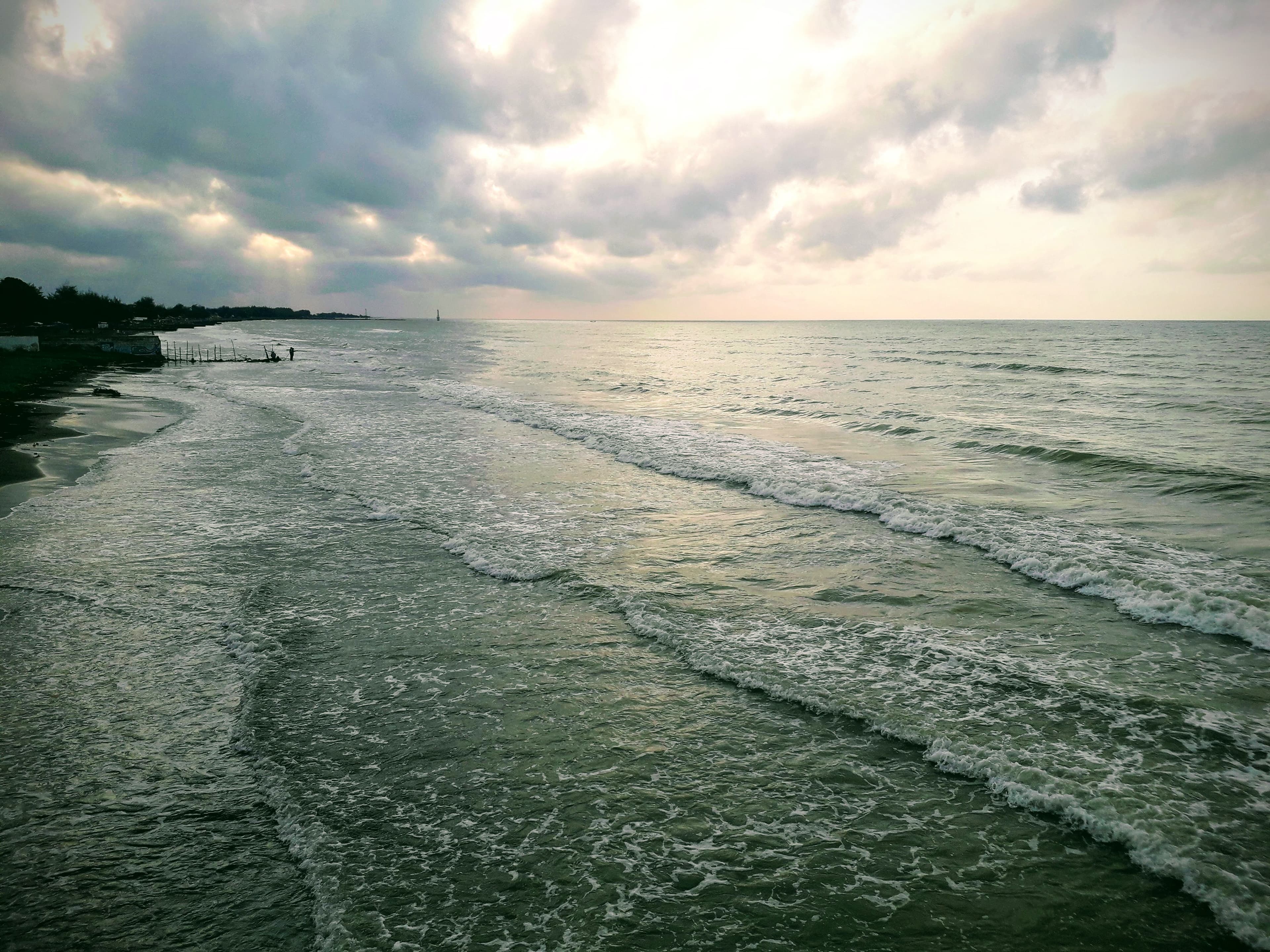 Pantai Widuri with sunset view and calm waves